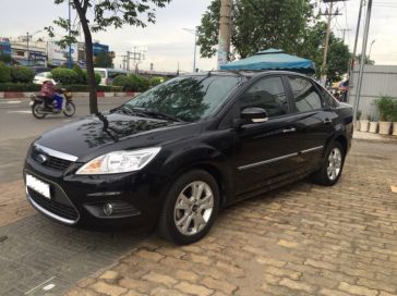 Bán Ford Focus 2.0 GhiA - 1/2011,màu đen, chính chủ